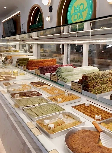 Artisan bakery items, traditional Turkish breakfast, and premium brunch selection served at Moda Cafe & Bakery in Richmond, Texas, in a cozy and modern setting.
